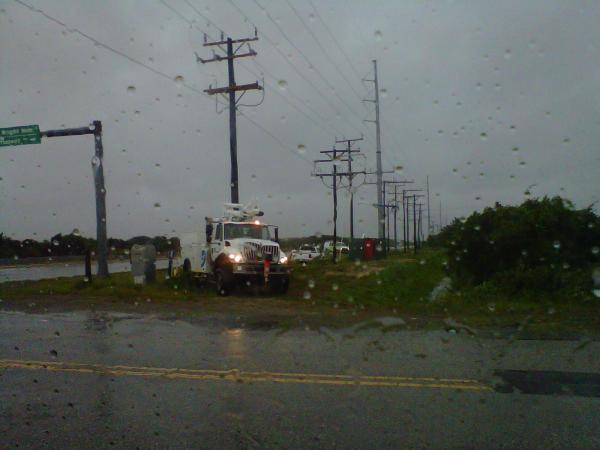 Reporter Erin Hartness sent this photo of Dominion power crews working to restore service to more than 85,000 customers near the coast.
