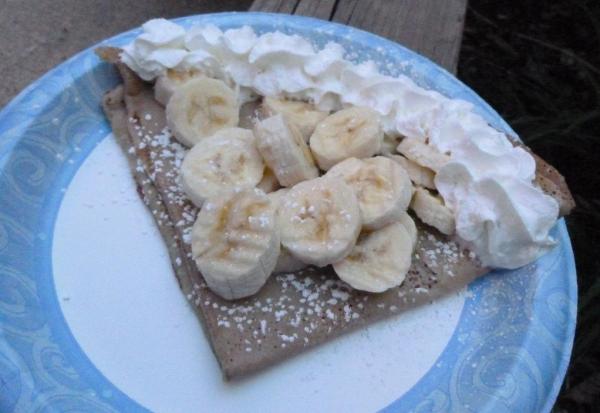 Crepe with banana and whipped cream