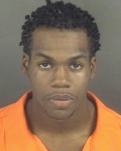 Fayetteville man charged in five robberies; accomplice sought