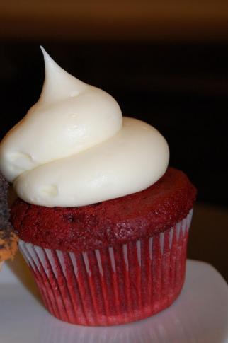 This cupcake is known as Big Red - it is red velvet covered in cream cheese icing.