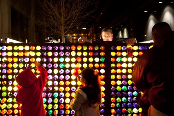 A giant Light Bright provides entertainment for people of all ages during First Night.