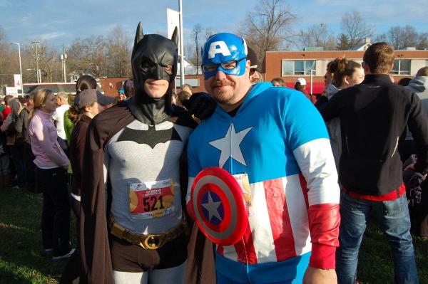 Racers often come in costume to the Krispy Kreme Challenge. The goal is to run about 2.5 miles to Krispy Kreme, eat a dozen donuts and run back. 
