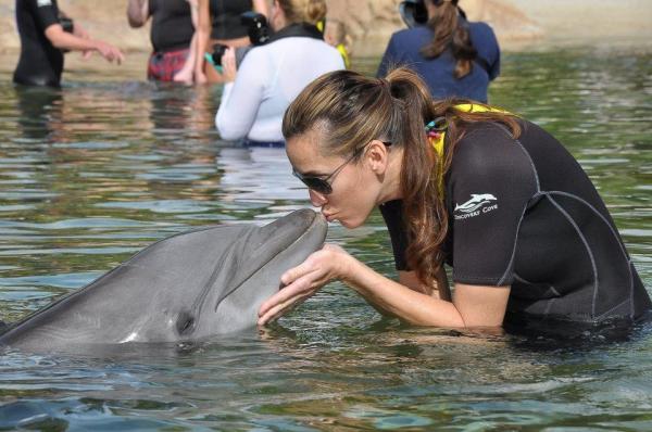 Lynda with a dolphin at Discovery Cove, Orlando
