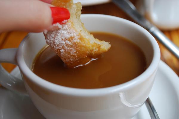 Fresh beignets pair perfectly with rich coffee at Rue Cler in Durham.