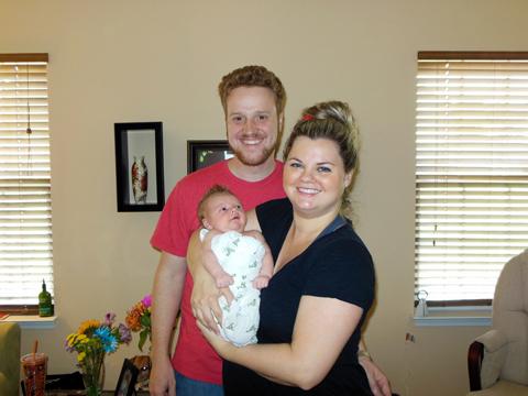 WRAL-TV systems administrator Phillip Boyd, his wife, Kristin, and their son, Blake. (Photo courtesy of the Boyd family)