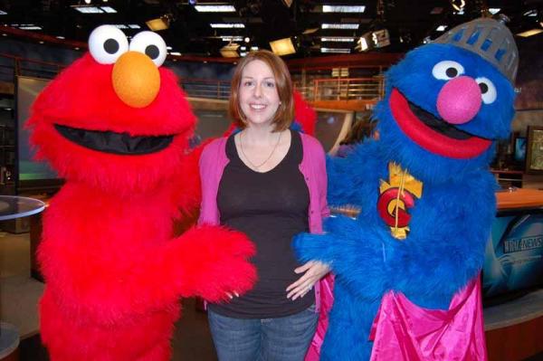 Kathy Hanrahan with Elmo and Super Grover