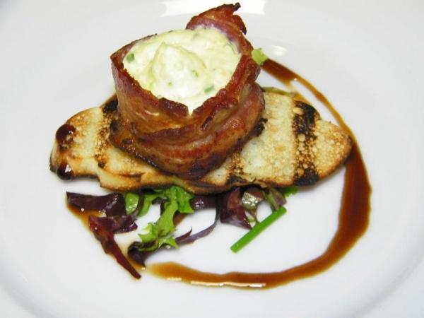 Course 2: Bacon Wrapped Cantaloupe & Goat Cheese Mousse with Balsamic Reduction - Mia Francesca (Photo by Judy Royal)