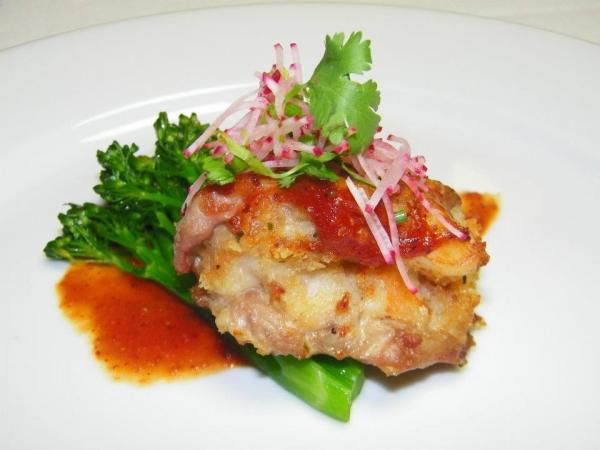 Course 2: NC Shrimp Stuffed Chipotle Honey Glazed Quail Breast with Grilled Broccolini (Photo by Judy Royal)