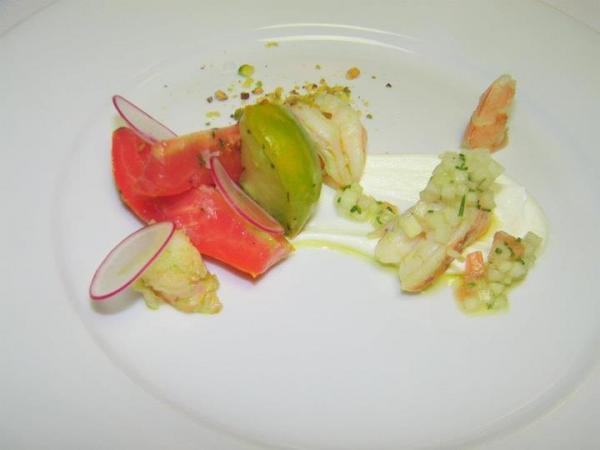 Course 2: Tomato Poached Shrimp with Marinated Tomato, Chevre Mousse & Pistachio. (Photo by Judy Royal)