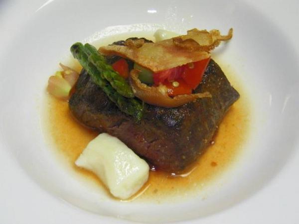 Course 4: Roasted Venison with Pickled Tomato, Potato Dumplings, Tomato Water & Bacon. (Photo by Judy Royal)