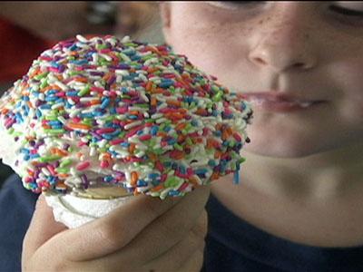 A child enjoys an ice cream cone at Sunni Skys.