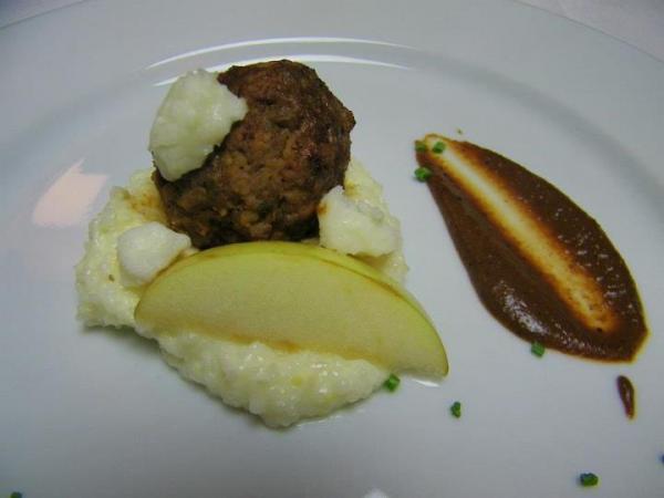 Course 2: Housemade Grits Sausage with Mole, Creamy Grits & Pickled Apple (Photo by Judy Royal)