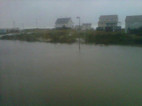 WRAL anchor/reporter Renee Chou (@chouchoutv) tweeted this picture, along with the message: "Wow! Parking lot of our hotel in #OBX turned into a pond #sandy"