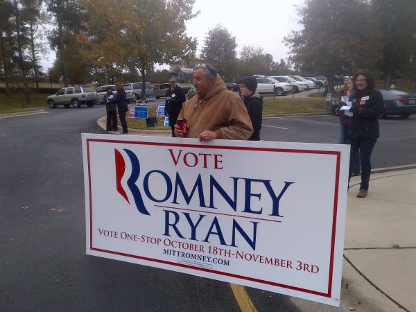James Powers, a Mitt Romney supporter, showed up early in Cary toting a big sign Tuesday, Nov. 6, 2012. 