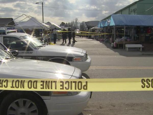 Two wanted in Durham flea market shooting