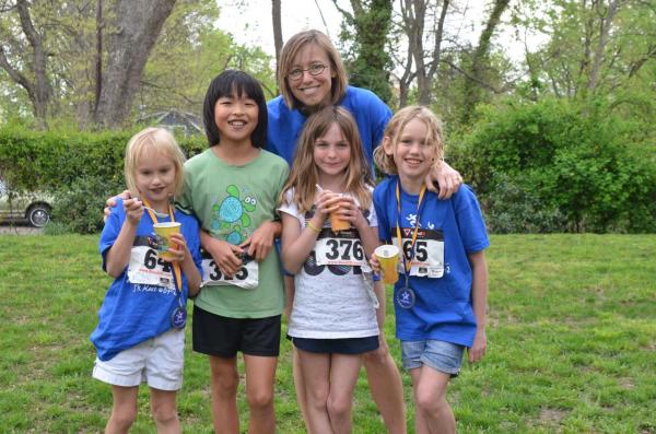 Liisa Ogburn at a 5k with her daughters and friends