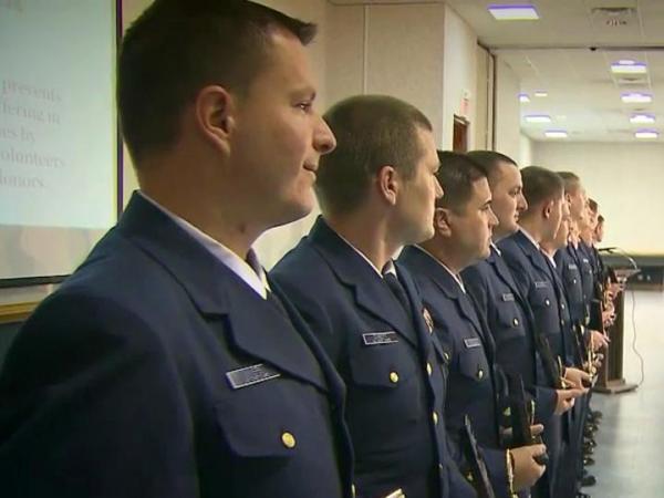 Coast Guard rescuers honored for saving 14 from sinking tall ship 