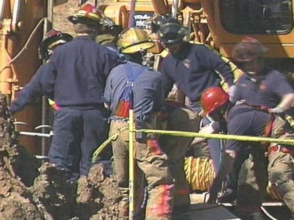 A team of rescue workers from Cary and Morrisville worked for two hours Tuesday to free a trapped construction worker. (WRAL-TV5 News)