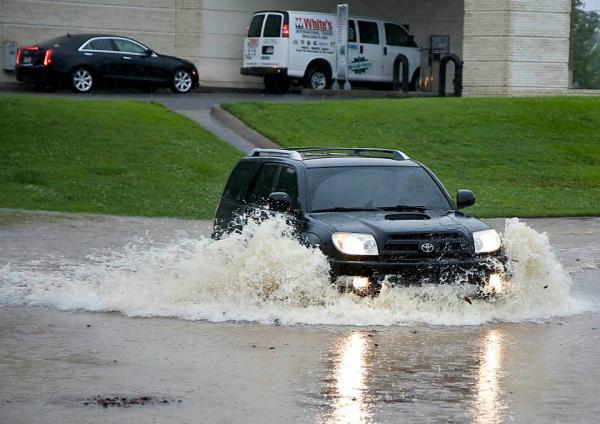 Andrea dumps rain, causes flooding in NC