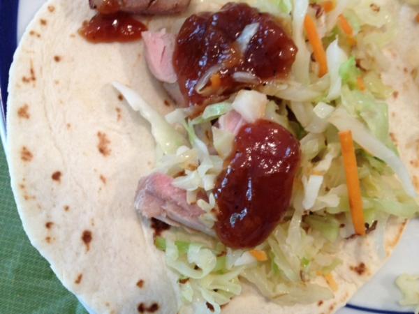 Tacos with cabbage, pork and plum sauce