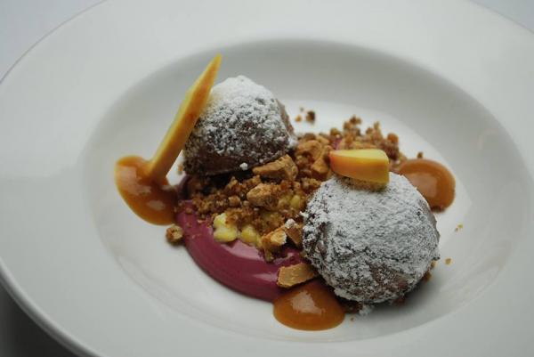 Course 5: Sweet Pickled Peaches, Salty Pecans, Chevre Donut, Caramelized White Chocolate, Blackberry Cream (Image from Fire in the Triangle) - Herons