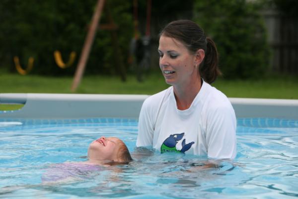 Natalie Monk takes an Infant Swimming Resource class with instructor Kelly Champon.