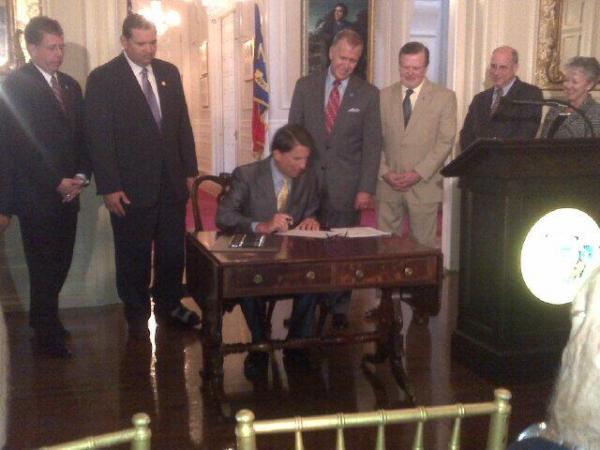 Gov. Pat McCrory signs the 2013 tax bill into law