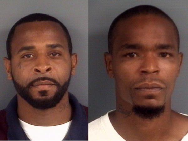 One charged, two sought in gas station slaying