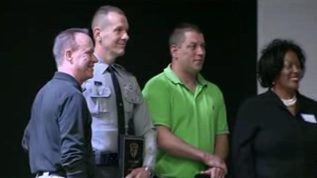 State trooper shot in face receives hero's award