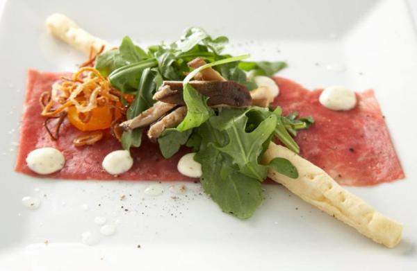 Course One: Certified Angus Beef® Brand Beef Carpaccio, Black Truffle Aioli, Cured Egg Yolk, Pickled Mushrooms, Crispy Shallots, Arugula, White Balsamic Truffle Gastrique, Smoked Sea Salt Grissini (Image from Competition Dining)