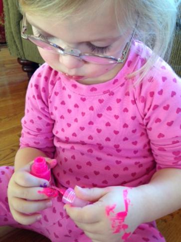 Sloane Heffernan's daughter gets into the pink nail polish.