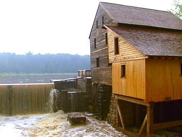 The water roars out of Yates Mill Pond.(WRAL-TV5 News)