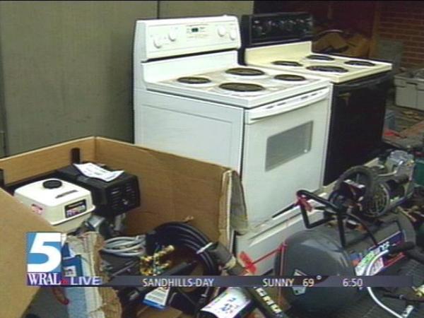 Two stoves and a brand new pressure washer are among the items being auctioned off by the Durham Police Department.(WRAL-TV5 News)
