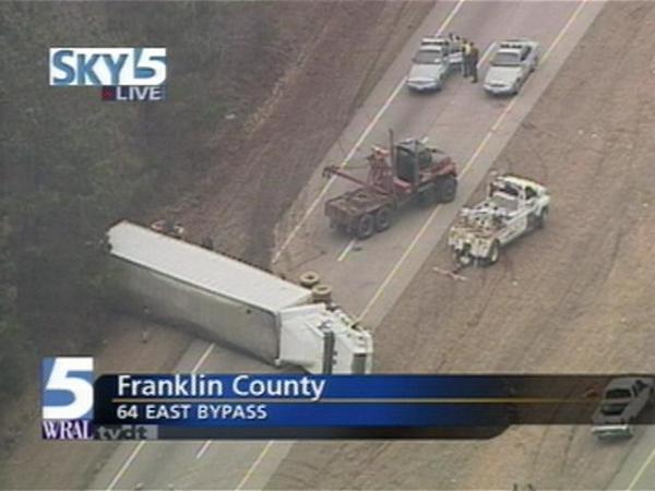 An overturned tractor-trailer is causing major traffic problems on U.S. Highway 64.(WRAL-TV5 News)