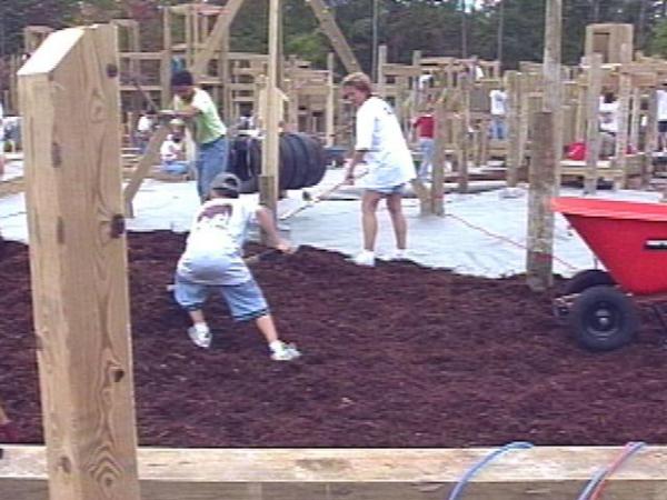 Volunteers hope to complete construction of this playground in Apex by Sunday to fulfill safety requirements. Volunteers are still needed to help meet the deadline.(WRAL-TV5 News)