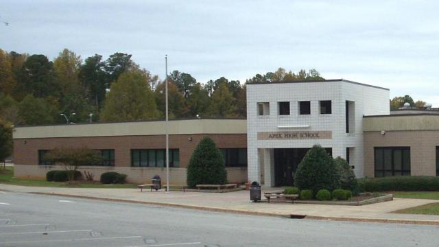 Extra security at Apex High after threat written on wall