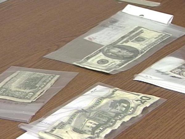 Police have confiscated 15 counterfeit bills since early December.(WRAL-TV5 News)