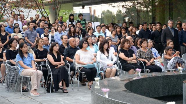 Hundreds gather to remember slain UNC professor