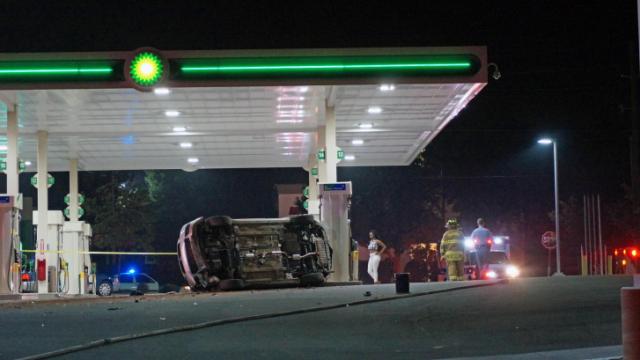 Car crashes on Glenwood Avenue, nearly clips gas pump