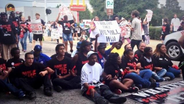 Protest over fast-food pay leads to arrests in Durham