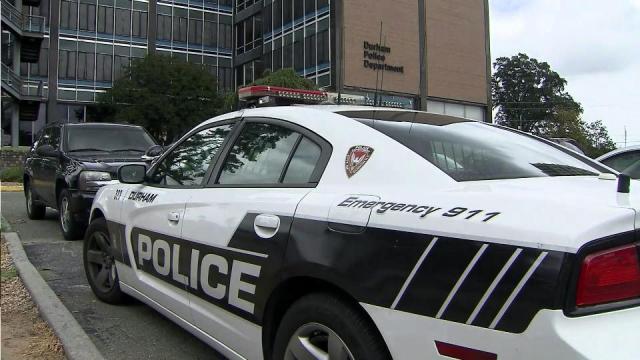 Police: Man struck Durham police car, fled scene