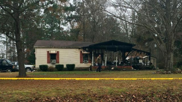 Woman escapes house fire that killed husband, sister