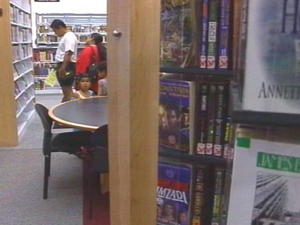In July, the library board voted to reduce hours rather than close two branches.(WRAL-TV5 News)