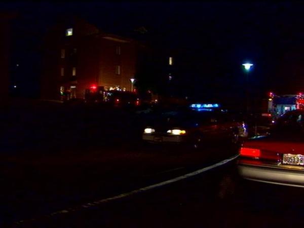 Vehicle lights lit up the area in front of Heilman dorm.(WRAL-TV5 News)