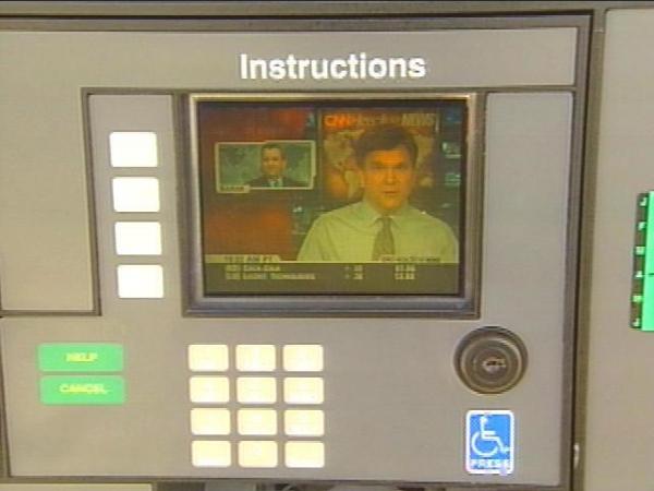Gas pumps are hooking up to space and cyberspace. Pumps at one north Raleigh gas station dish out CNN Headline News while you fill up.(WRAL-TV5 News)