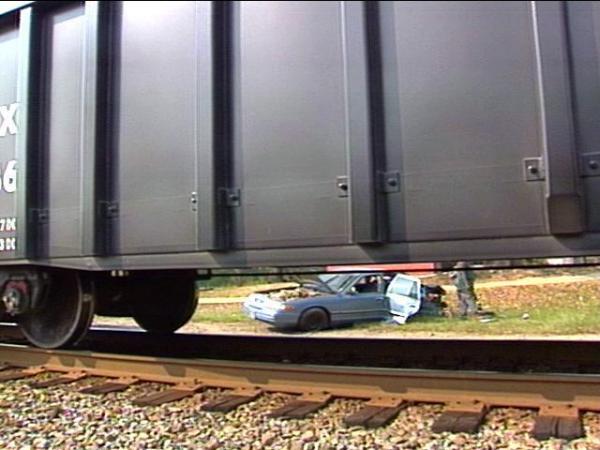 The Crown Victoria was sitting on the tracks as it was hit.(WRAL-TV5 News)