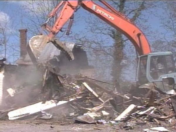 The Rocky Mount house, where seven people died in a fire, was torn down Tuesday. However, the survivors say they did not want it torn down yet.(WRAL-TV5 News)