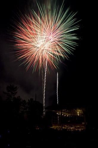 Fireworks illuminate the sky over Booth Amphitheater.