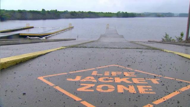 Witness: Woman tried to thwart rescue after driving car into Jordan Lake