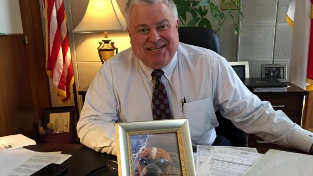 Sen. Tom Apodaca with a picture of Raleigh